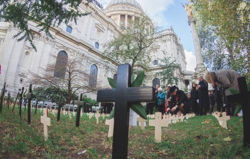 The Garden of Remembrance, with crosses and poppies, is shown in the foreground with the Cathedral behind