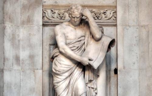 The monument to Samuel Johnson depicts him leaning on a column, dressed in antique drapes, and contemplating a scroll