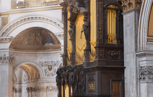 The organ pipes at St Paul's, lit by sunbeams from the Dome.