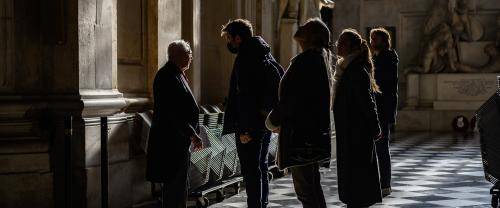 worship congregation dark nave talking service