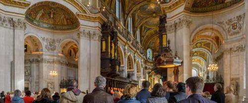 large congregation standing in the cathedral